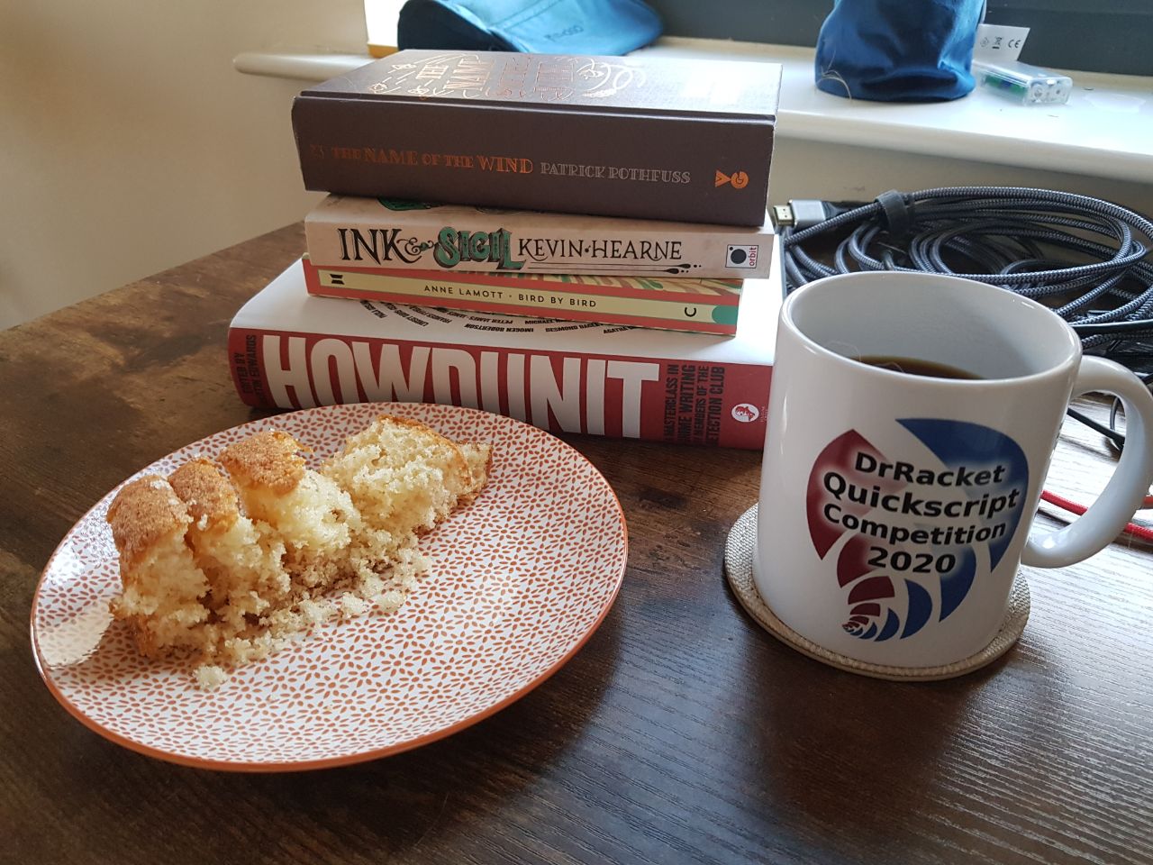 A good way to start the day: coffee, cake, and books.